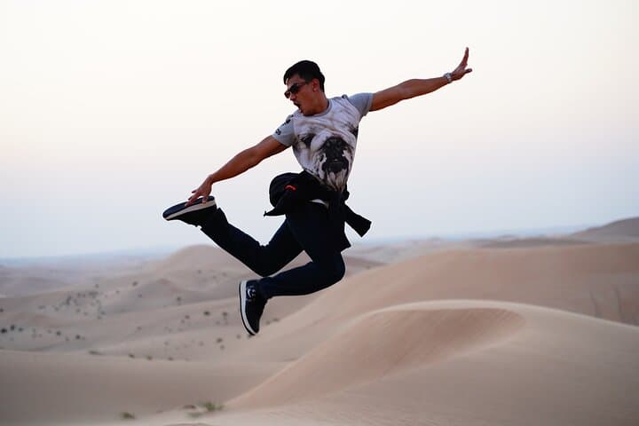 Private Desert Safari Near Abu Dhabi: Camel Ride, Sandboarding & Dune Bashing photo 2