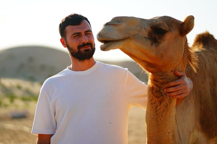 Private Desert Safari Near Abu Dhabi: Camel Ride, Sandboarding & Dune Bashing photo 3