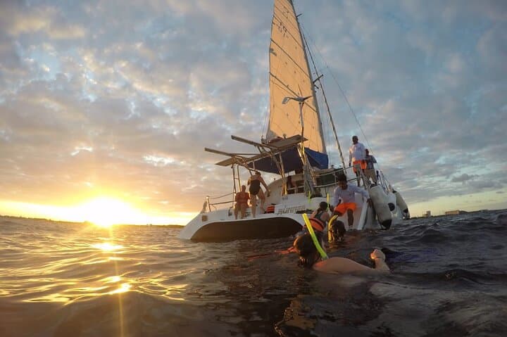 Sunset Catamaran Cruise in Cancún: Private Sail & Punta Sam Snorkel