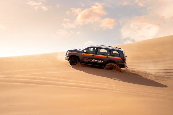 Red Dune Safari in Dubai: Premium BBQ, Camel Ride & Dune Bashing Experience