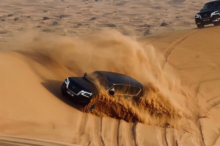 Dubai Red Dunes Premium Desert Safari: Camel Ride, Sandboarding & BBQ Dinner photo 2
