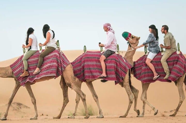 Red Dunes Adventure: Dubai Quad Bike Safari, Camel Ride & Desert Dinner photo 4