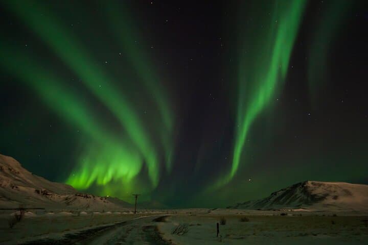 Tromsø Northern Lights Minibus Chase — Photo-Guided Aurora Hunt photo 3