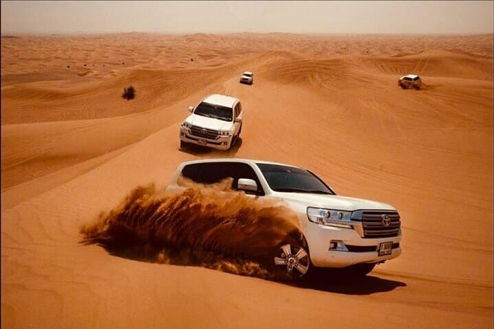 Dubai Desert Safari: Sunset Dune Bashing & Bedouin Camp Experience