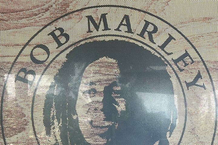 From Montego Bay to Kingston: Bob Marley Museum & Devon House Day Tour photo 2