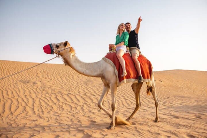 Doha Desert Safari VIP: Dune Driving, Camel Ride & Sandboarding photo 5