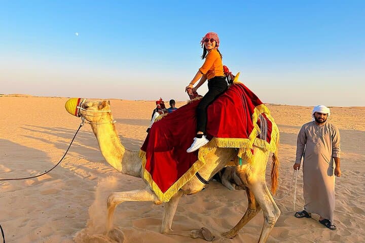 Sunset Desert Safari Abu Dhabi — Dune Bashing, Camel Ride & BBQ Under the Stars