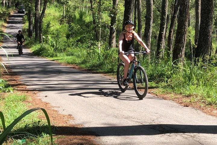 Tukad Cepung Waterfall Cycling Tour: Ride to Bali's Hidden Curtain Falls photo 3