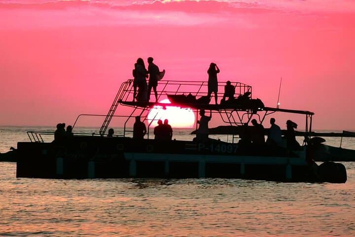 Tamarindo Sunset Catamaran Cruise: Snorkel, Paddleboard & Open Bar on the Pacific