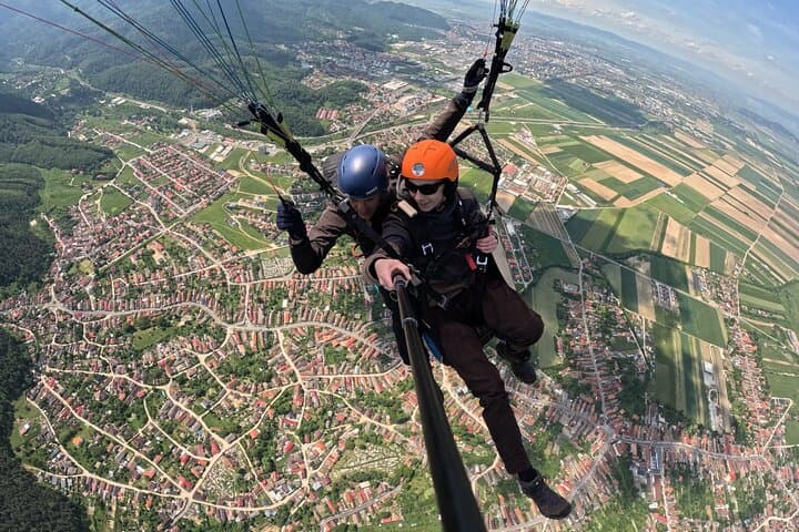 Tandem Paragliding from Postăvaru Peak — Poiana Brașov Cable-Car Flights photo 3