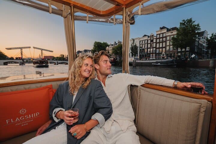 Glide Amsterdam’s Canals: Classic Saloon Boat Cruise with Live Guide photo 3