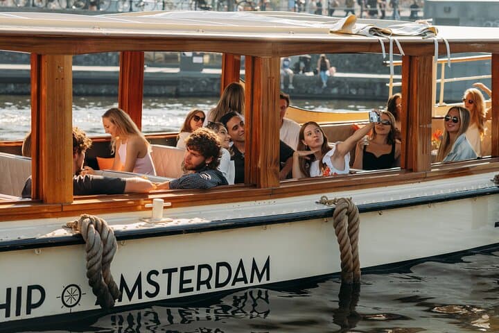 Glide Amsterdam’s Canals: Classic Saloon Boat Cruise with Live Guide photo 2