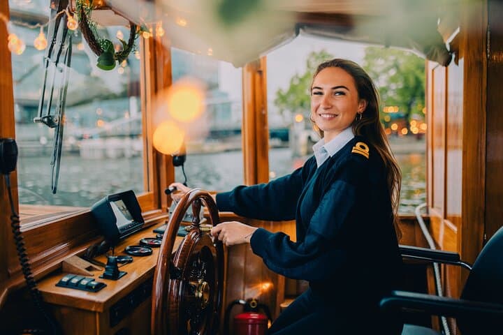 Glide Amsterdam’s Canals: Classic Saloon Boat Cruise with Live Guide photo 6