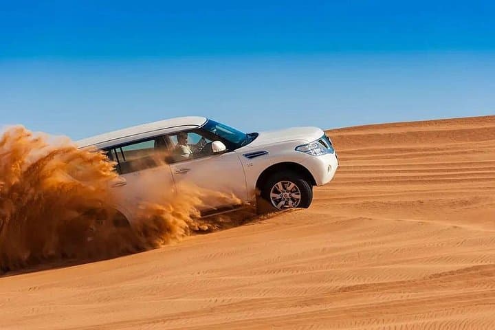 Red Dunes Desert Safari Dubai: Dune Bashing, Sandboarding & Bedouin Camp photo 2