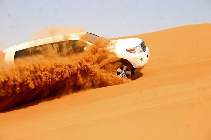 Abu Dhabi Desert Safari: 4x4 Dune Bashing, Quad Biking & Desert Dinner Experience photo 2