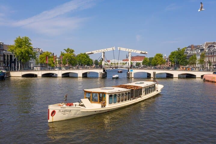 Luxury Amsterdam Saloon Boat Canal Cruise with Drinks — 1-Hour Guided Tour