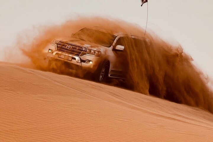 Red Dunes Desert Safari: ATV, Dune Bashing, Camel Rides & BBQ in Dubai