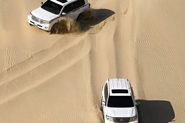 Dubai Red Dunes Morning Safari: 4x4 Dune Bashing, Sandboarding & Camel Ride photo 3
