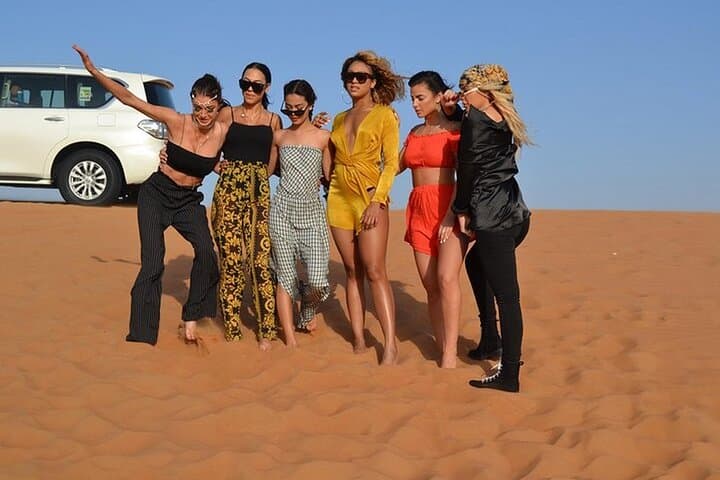 Morning Red Dunes Safari in Lahbab: Dune Bashing, Sandboarding & Camel Ride photo 4