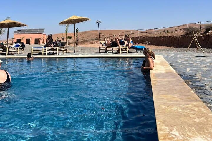Agafay Desert Day Pass: Quad Biking, Camel Ride, Pool & Moroccan Lunch