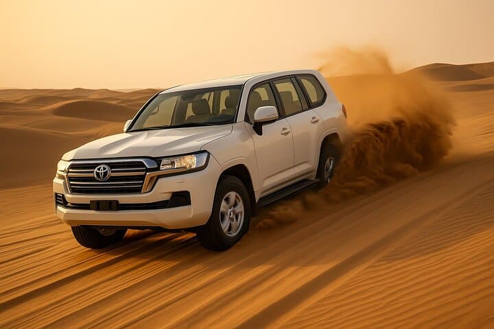 VIP Evening Desert Safari Dubai: Dune Bashing, Sandboarding & Bedouin Camp Experience