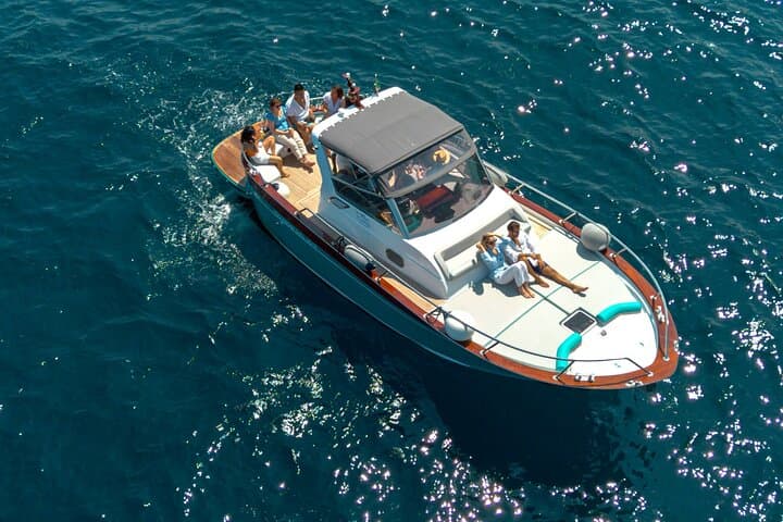 Capri Boat Tour from Sorrento — Swim the Grottos, See the Faraglioni & Light Lunch photo 2