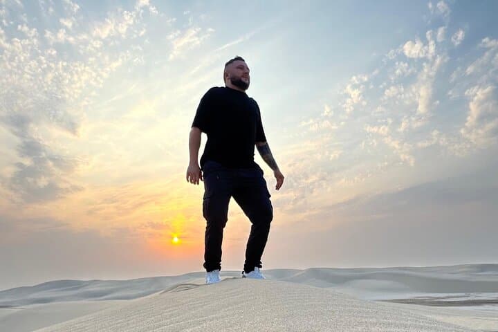 Sunrise to Stars: Doha Desert Safari & Sandboard Experience photo 2