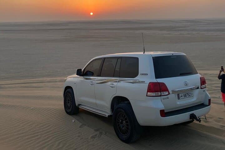 Sunrise to Stars: Doha Desert Safari & Sandboard Experience photo 3