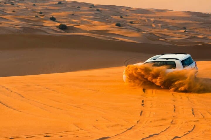 Sunset Luxury Desert Safari Dubai: Dune-Bashing, Camel Rides & Live Shows