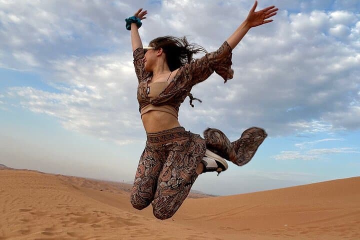 Sunrise Dubai Desert Safari: Private Camel Ride, Dune Bashing & Sandboarding photo 2