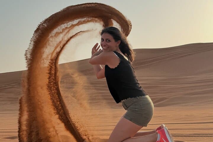 Sunrise Dubai Desert Safari: Private Camel Ride, Dune Bashing & Sandboarding photo 3