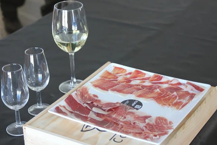 Iberian Ham Day Trip from Seville: Cellars, Dehesa & Aracena Caves