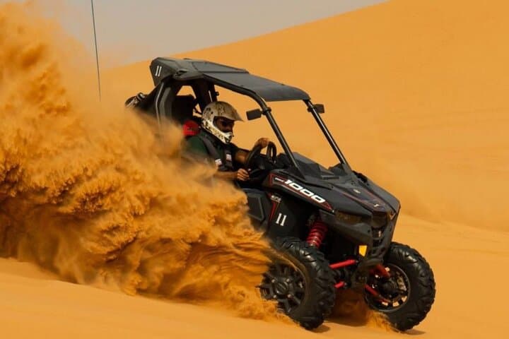 Dubai Dune Buggy & Evening Desert Safari: Sandboarding, Dune Bashing & BBQ
