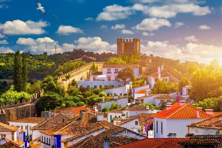 Coimbra to Fátima, Nazaré & Óbidos Private Car Tour photo 2