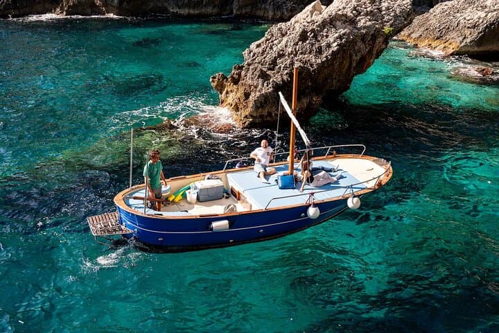 Around Capri by Gozzo: 3-Hour Private Boat Tour to the Blue Grotto and Hidden Caves