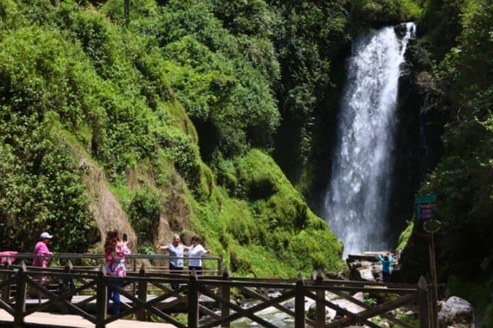 Otavalo Full-Day: Peguche Waterfall, Quitsato Sundial & Artisan Markets photo 5