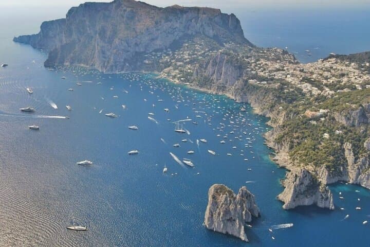 Full-Day Private Capri Boat Tour: Blue Grotto, Faraglioni & Snorkeling photo 1