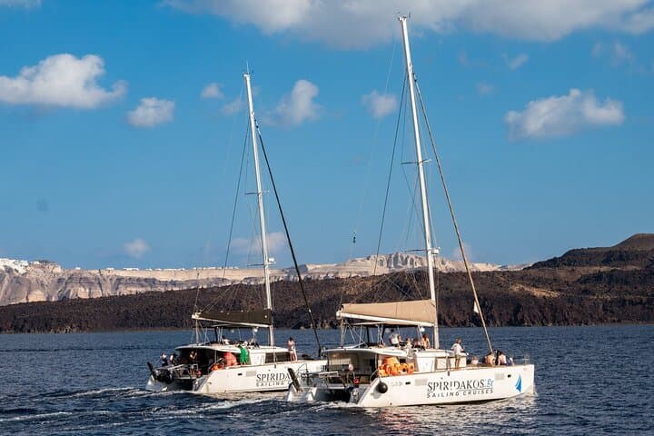 Santorini Catamaran Cruise: Caldera Views, Volcano Swim & BBQ Experience photo 5