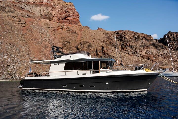 Santorini Private Motor Yacht: Caldera Cruise to Red & White Beaches, Hot Springs & Snorkel photo 2