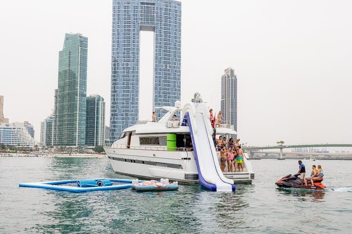 Dubai Harbour Yacht Cruise with Swim, Slide & Live BBQ photo 3
