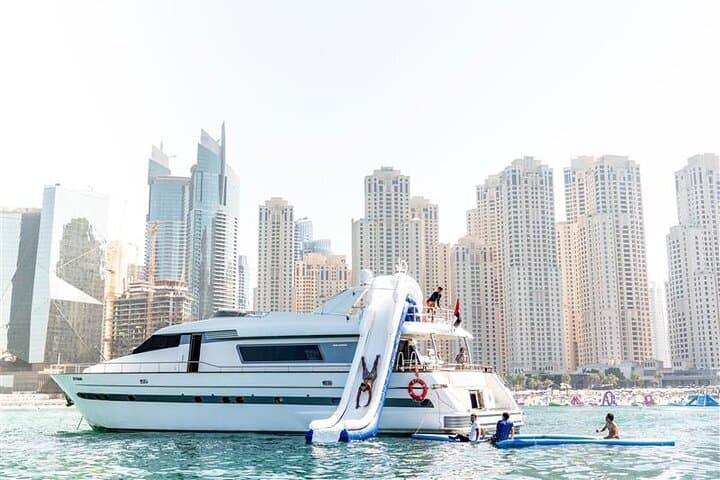 Dubai Harbour Yacht Cruise with Swim, Slide & Live BBQ photo 4