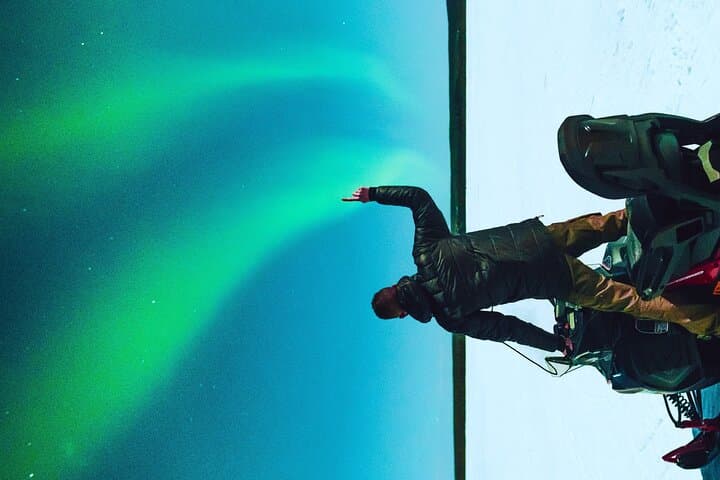 Chasing the Northern Lights on a Snowmobile Adventure in Rovaniemi photo 3