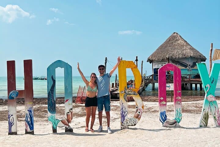 Holbox Island Day Trip from Cancun: Boat Ride, Biking & Cenote Swim