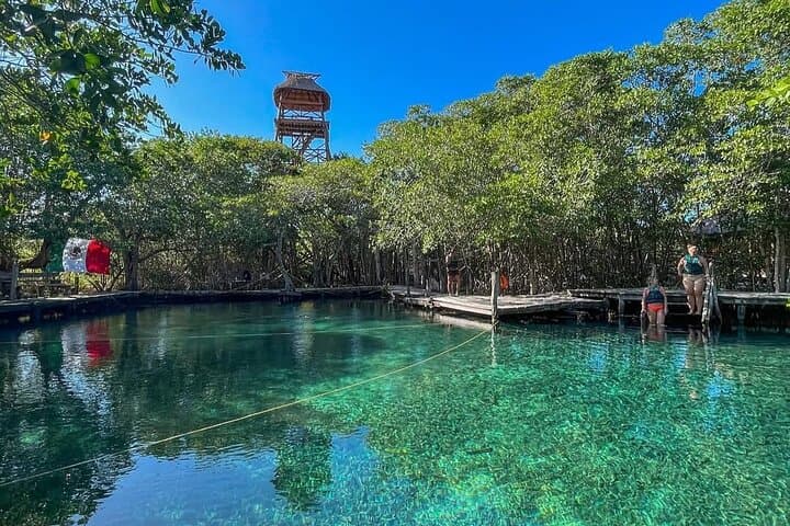 Holbox Island Day Trip from Cancun: Boat Ride, Biking & Cenote Swim photo 5