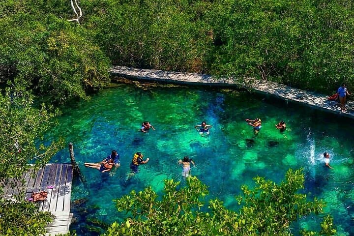 Holbox Island Day Trip from Cancun: Boat Ride, Biking & Cenote Swim photo 6