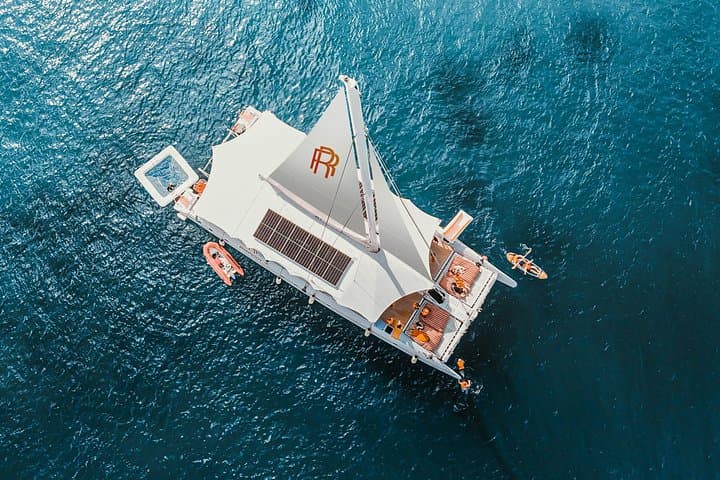 Phuket Catamaran to Coral & Racha Islands — Snorkel, Paddle, and Sunset Party photo 1