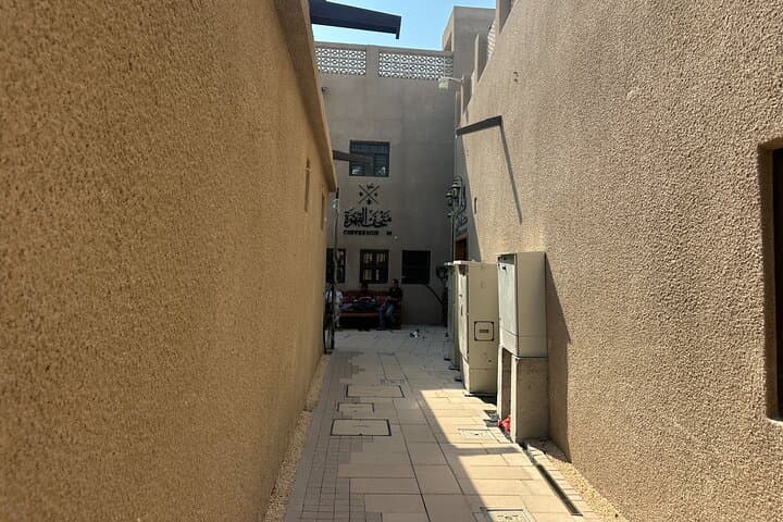 Old Dubai Walking Tour: Abra Ride, Al Fahidi & Traditional Souks photo 3