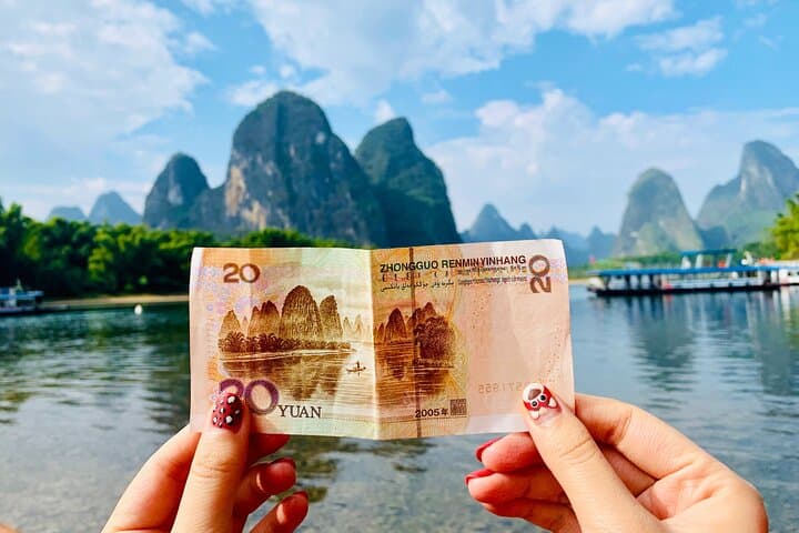 Private Guilin Day Tour: Reed Flute Cave, Li River Raft & Impression Liu Sanjie photo 2