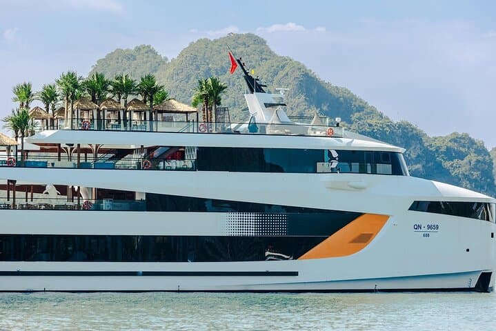 Dolphin Day Cruise Halong Bay Luxury Day Trip with Pool, Kayaking & Sunset Party photo 2