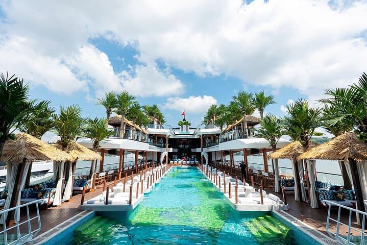Dolphin Day Cruise Halong Bay Luxury Day Trip with Pool, Kayaking & Sunset Party photo 4